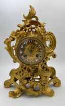 A French gilt bronze mantel clock signed Chaudé Hger du Roi. Stamped Lons Brevette. Strikes on the