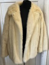 A vintage short pale mink jacket. Approximately 58cm laid flat across the chest.