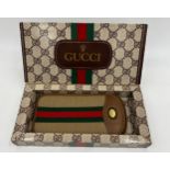 Gucci glasses case in original presentation box. Case measures 17cm x 8cm.