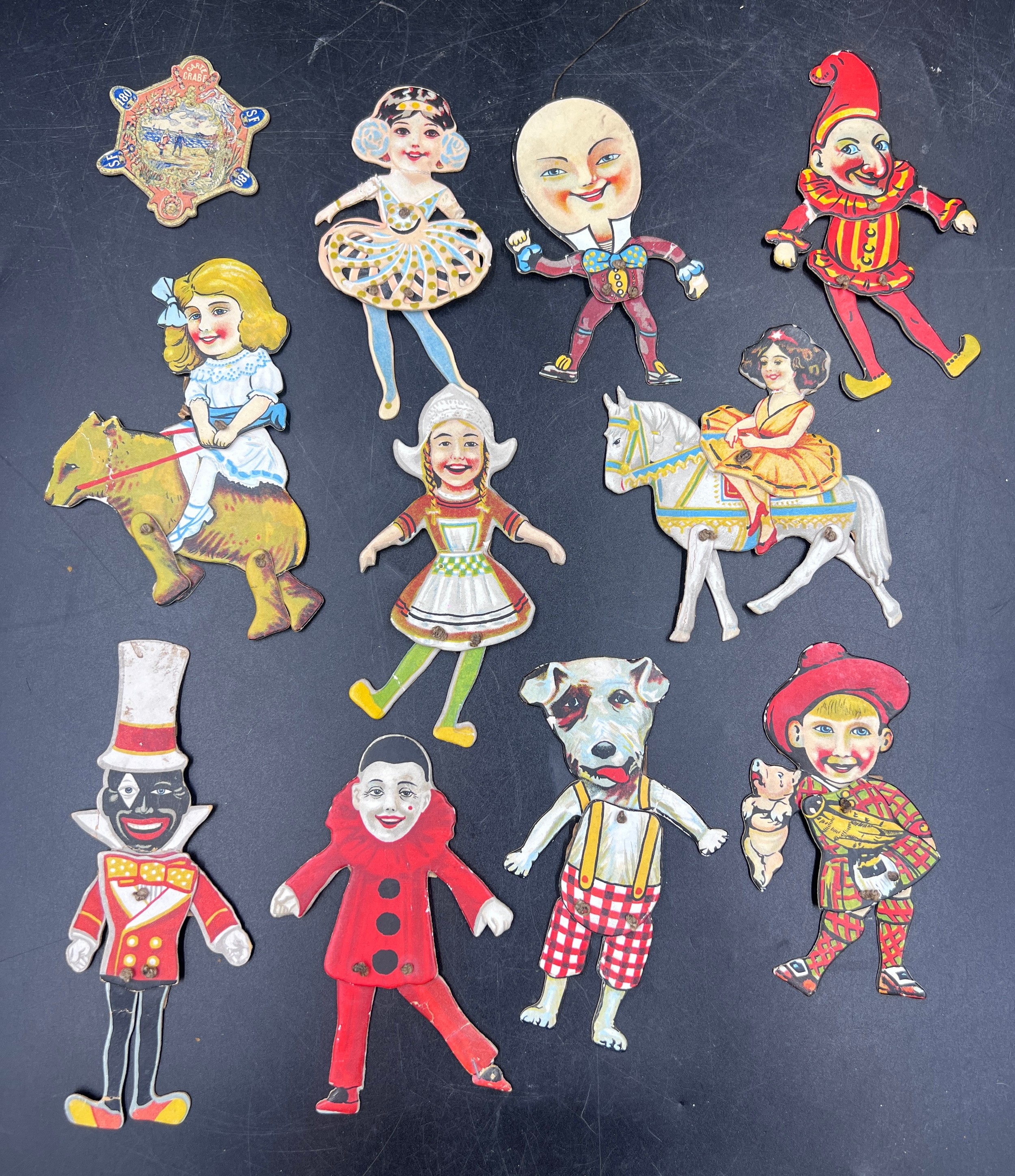 Ten various Edwardian paper doll puppets to include Humpty Dumpty, Jester, Clown, Ballerina etc.