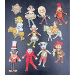 Ten various Edwardian paper doll puppets to include Humpty Dumpty, Jester, Clown, Ballerina etc.