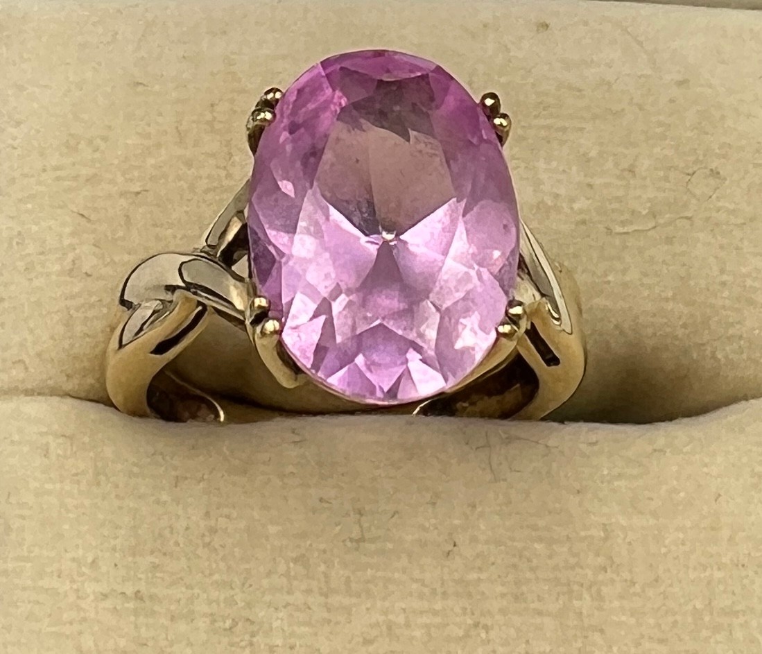 A 9 carat gold gem set ring. Size K, weight 4.2gm.
