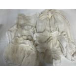 A collection Victorian Nightgowns (4), Petticoats (3) along with 6 Christening Gowns all in cotton/