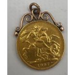 A 1907 Edwardian full gold sovereign mounted in unmarked yellow metal with suspension ring. Total