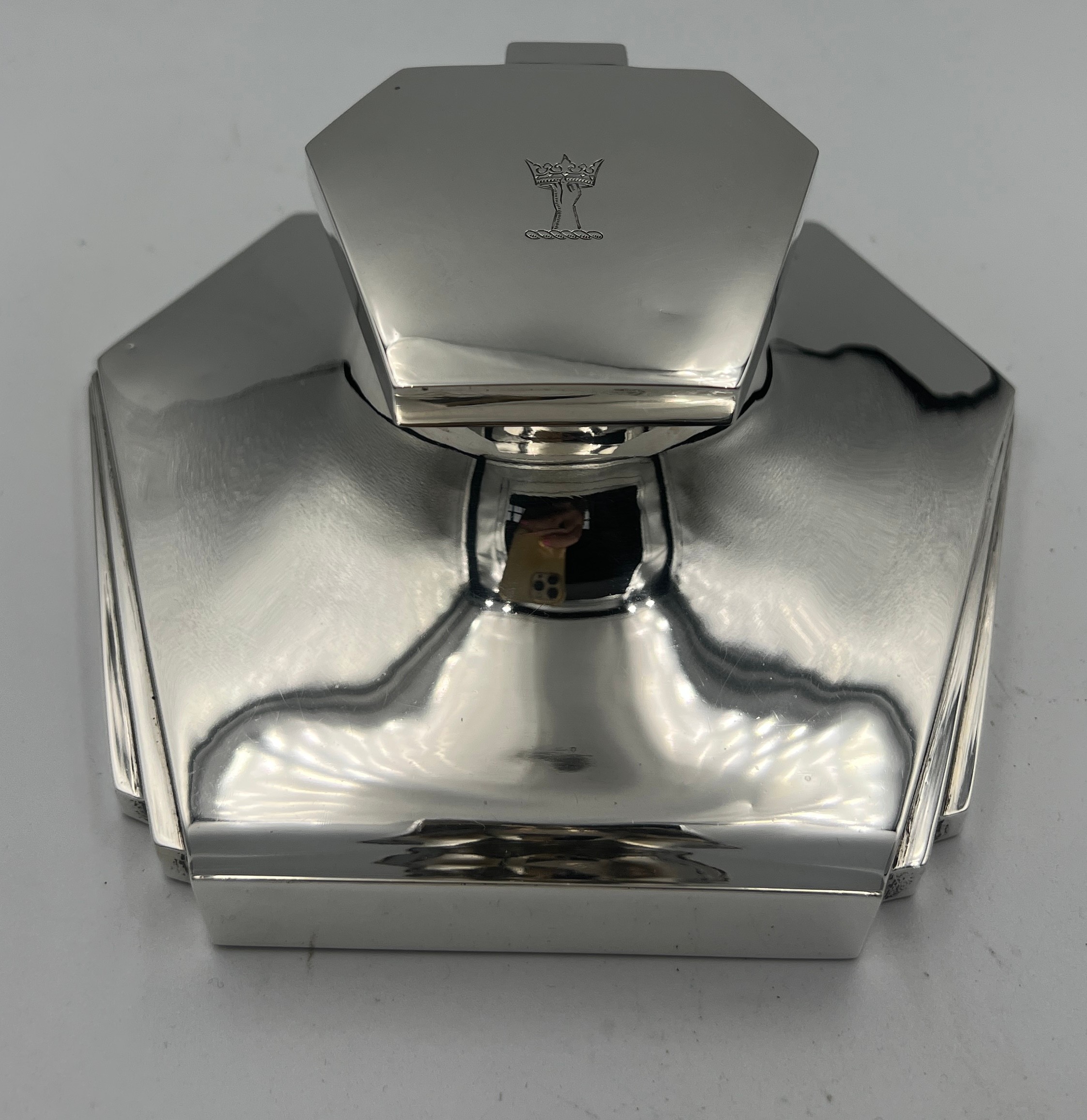 A hallmarked silver inkwell with clear glass liner and mahogany base. Sheffield 1949. Maker Mappin &