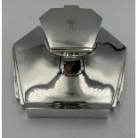 A hallmarked silver inkwell with clear glass liner and mahogany base. Sheffield 1949. Maker Mappin &