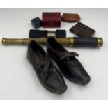 A miscellany to include a pair of 19thC child’s leather and wooden clogs, a brass and leather