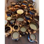 A large quantity of mainly 19thC copper lustre ceramics.