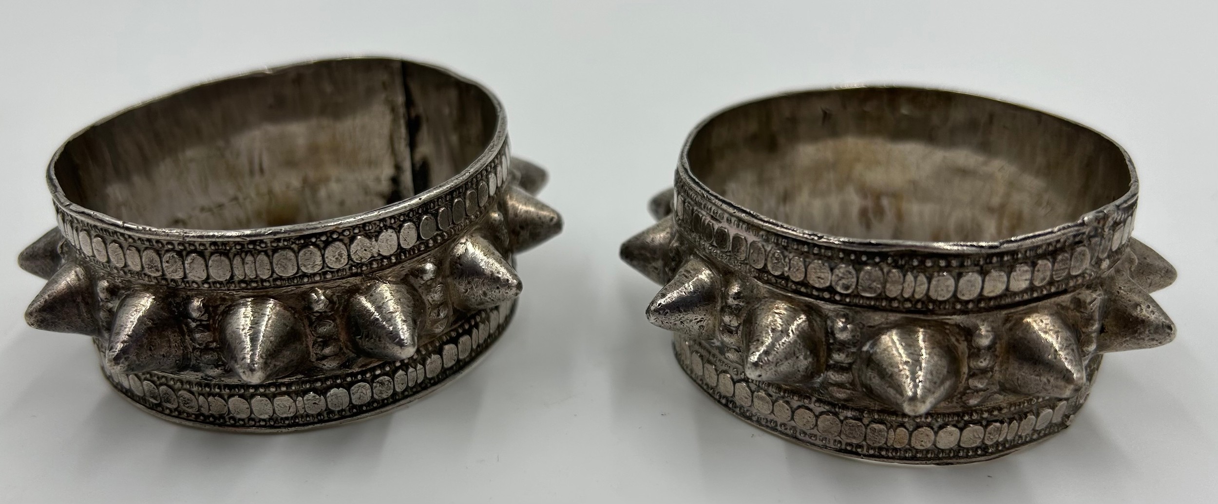 A pair of white metal Omani fertility bracelets. 147gm. 6.2cm approx.