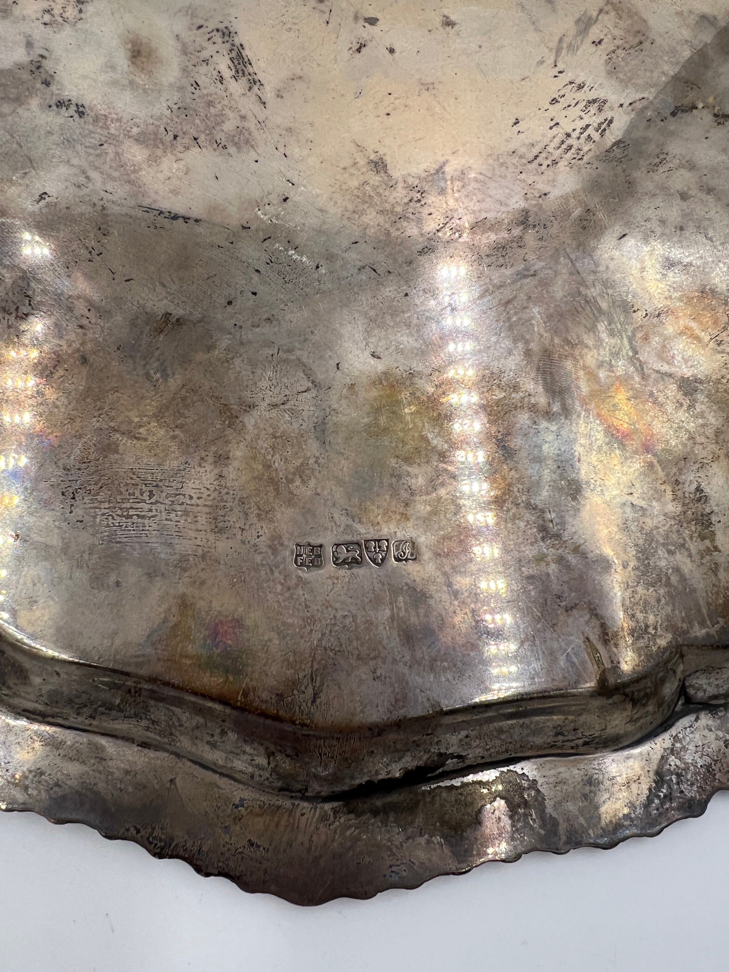 A hallmarked silver tray with gadrooned edge raised on four feet. Weight 880gm. 37cm diameter. - Bild 3 aus 3