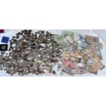 A large collection of coins and notes, mostly foreign to include India, Singapore, Pakistan,