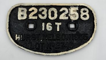 Cast iron wagon plate, Hurst Nelson 1955. 28cm x 16cm.