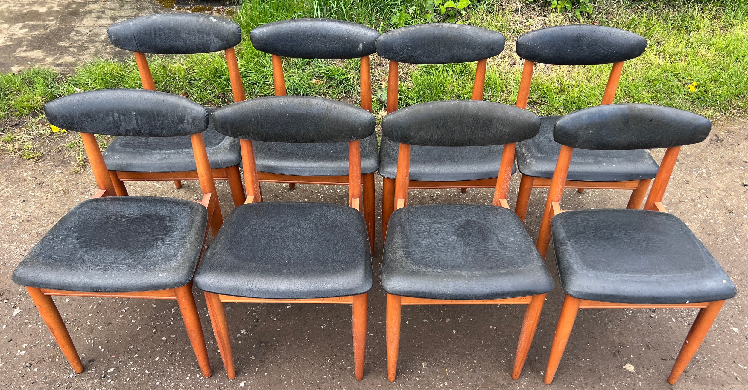 A set of eight mid 20thC Schreiber dining chairs. Height to back 75cm.