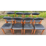 A set of eight mid 20thC Schreiber dining chairs. Height to back 75cm.