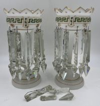 A pair of 19thC glass lustres with green and gilt decoration.