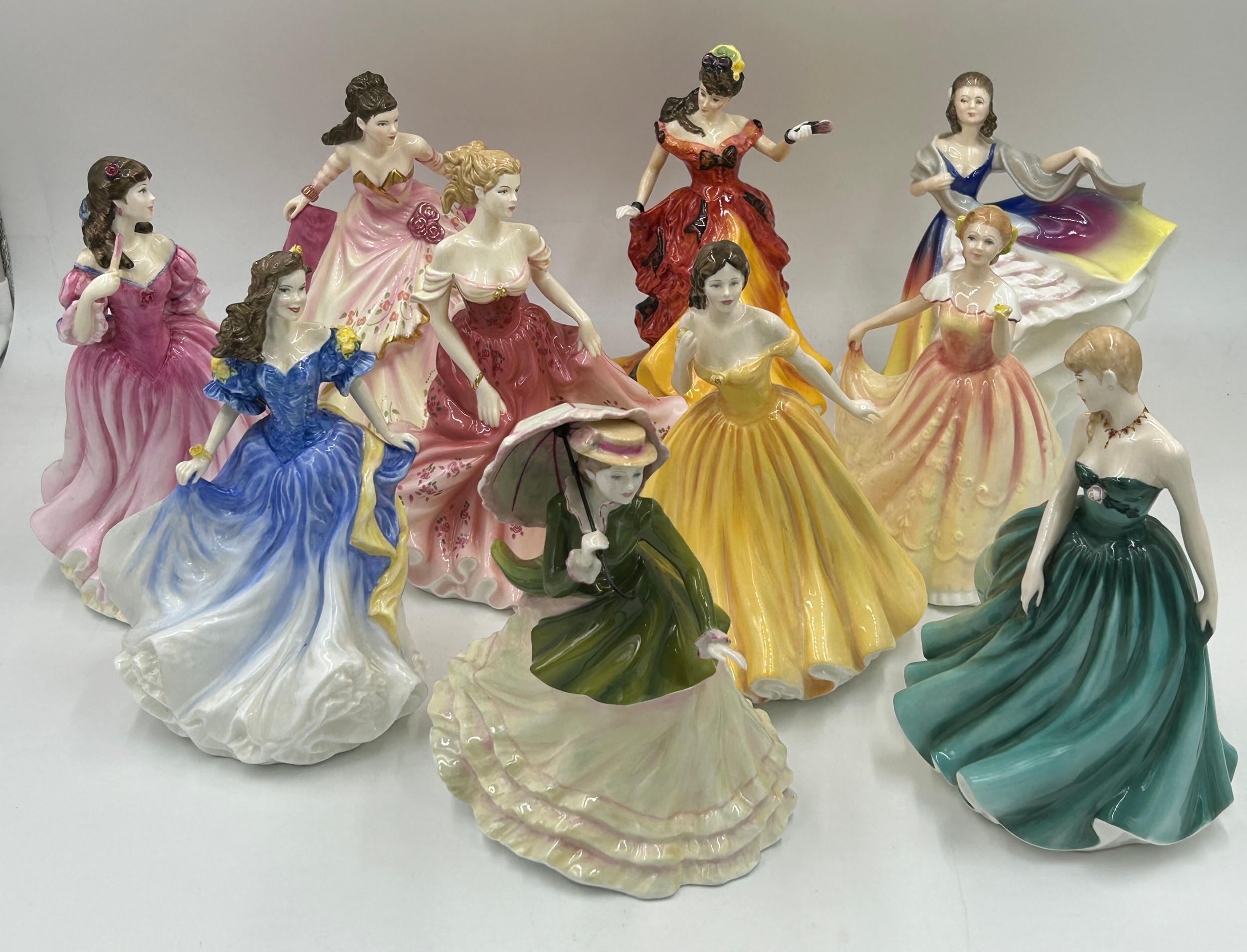 Ten Royal Doulton figurines: Figure of the Year 1998 HN4041 Rebecca, 2003 Elizabeth HN4426, 1995