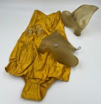 A 1950’s ladies strapless bathing costume with zip to back and ruched sides together with a pair