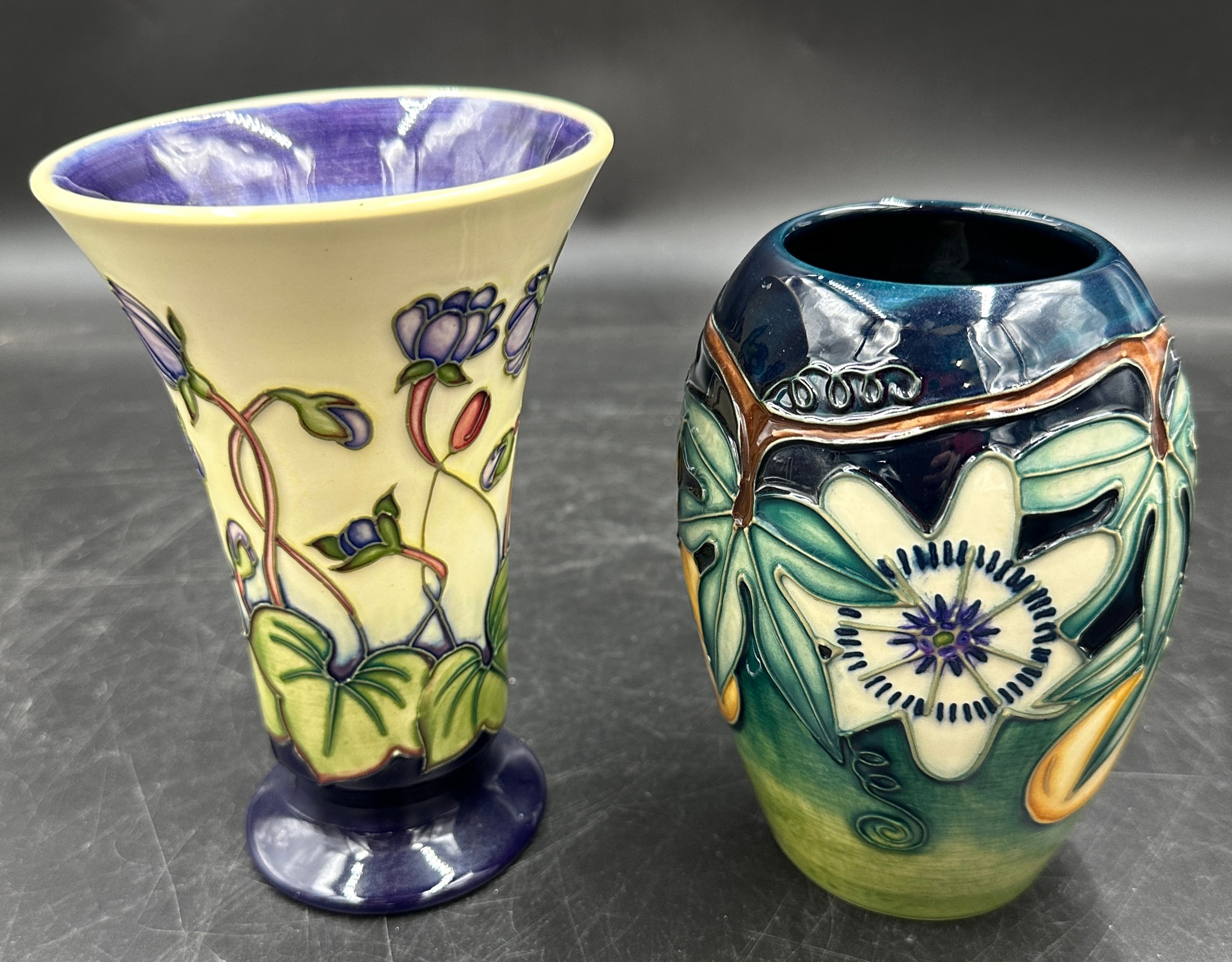 Two small Moorcroft vases, comprising Hepatica, dated 1999, approx 16cm h and 'Passion Flower',