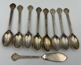 Eight silver teaspoons and a butter knife, total weight 141.5gm. Sheffield 1977, maker Cooper