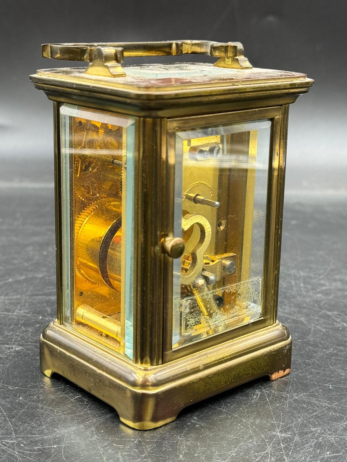 Two brass case carriage clocks to include Garrad & Co London W1 and Henley England marked to back - Image 9 of 11