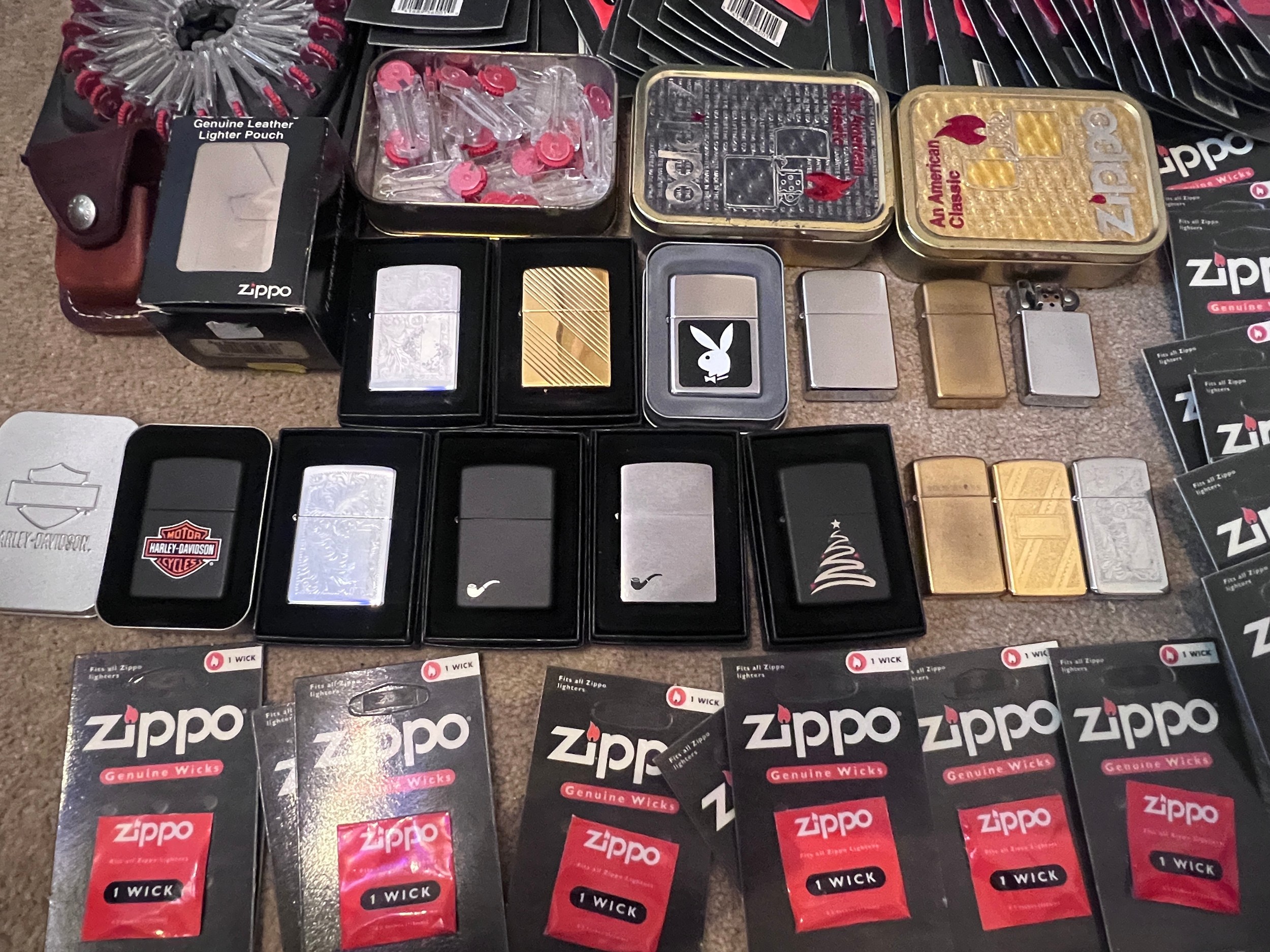 A large collection of mostly boxed Zippo lighters to include Harley Davidson, Bunny, older brass - Image 3 of 10