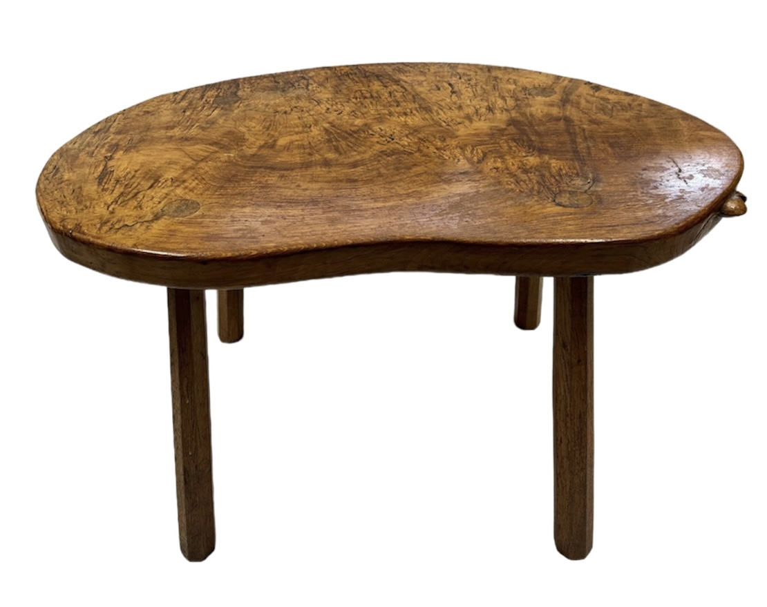 A Robert Thompson, ‘Mouseman’ kidney shaped burr oak table on four octagonal legs with signature