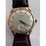 A 1956 manual 10k gold plated Bulova NY Executive Retro Curvex wristwatch with subsidiary seconds