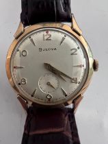 A 1956 manual 10k gold plated Bulova NY Executive Retro Curvex wristwatch with subsidiary seconds