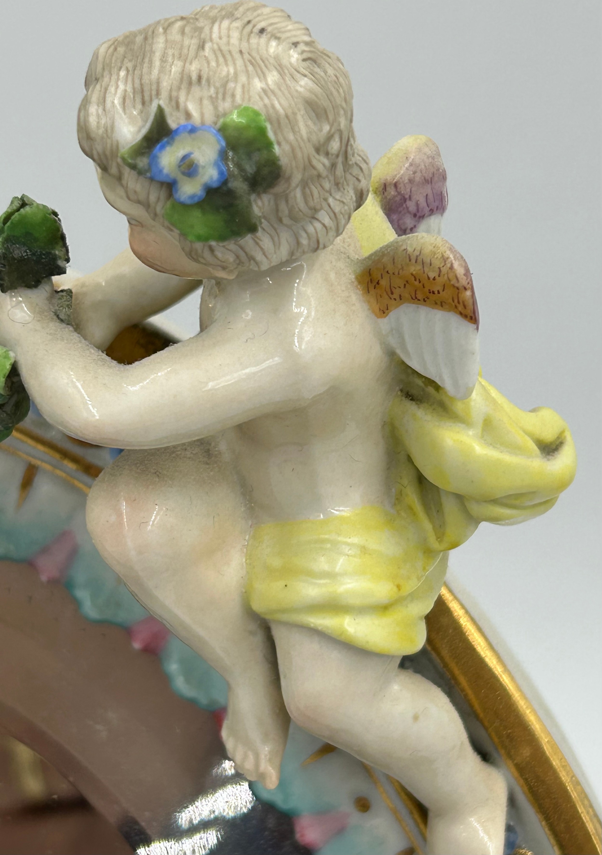 A Continental porcelain vanity easel mirror with applied cherub and floral decoration and bevelled - Image 5 of 13