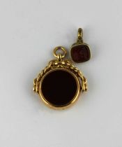 An 18ct gold bloodstone and cornelian rotating fob seal Birmingham 1888, gross weight 16.2g and a