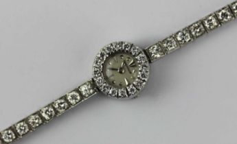 A Jaeger-LeCoultre ladies diamond set dress bracelet wristwatch the signed silvered dial with dot