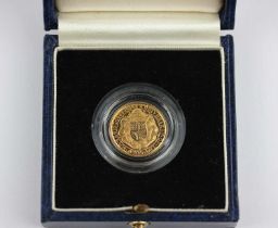 A 1989 commemorative gold half sovereign to commemorate the 500th anniversary of the first gold