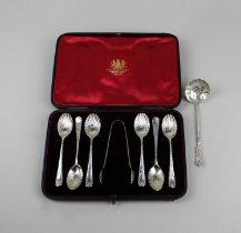 A set of six Victorian silver spoons and matching sugar tongs, with shell shaped bowls, maker Mappin