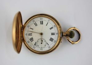 A gold hunter pocket watch faintly marked 'K18', presentation engraved, the enamel dial with Roman