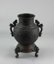 A Chinese bronze censer (missing cover) raised on three feet 23cm high