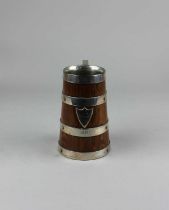 A late Victorian oak and silver plated bound tankard inscribed 1889