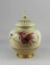 A Royal Worcester porcelain pot pourri vase, inner cover and cover, decorated with poppies amongst