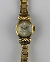 A Rotary 9ct gold ladies watch with rolled gold bracelet strap
