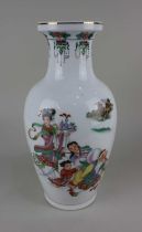 A Chinese porcelain baluster vase with polychrome figural decoration 36cm high