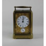 A 19th Century Aubert & Klaftenberger Geneve gilt brass repeater carriage clock with alarm, circular