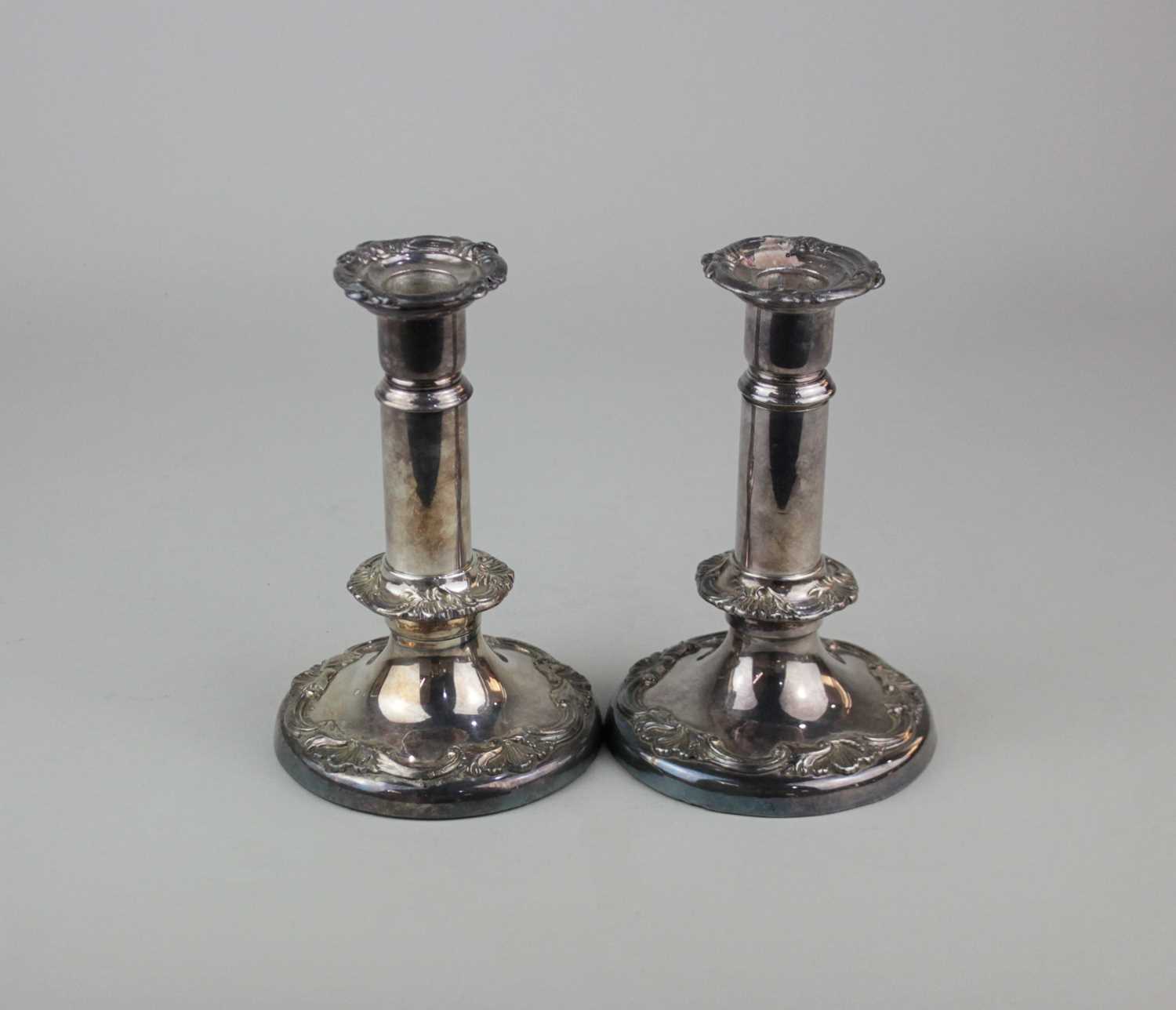 A pair of silver plated candlesticks possibly Irish with removable drip trays and single - Image 2 of 2