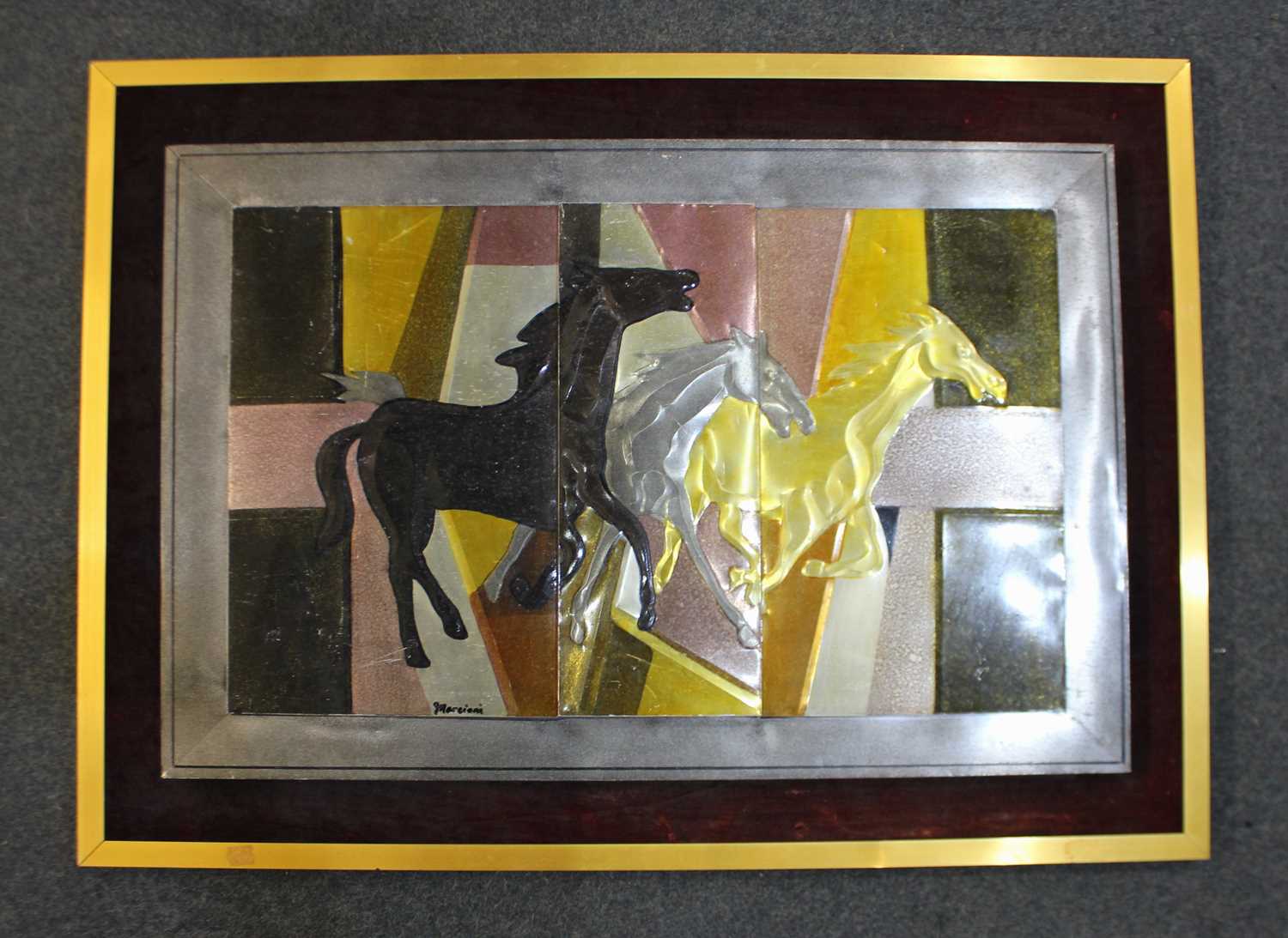 Marciani (late 20th century), a metal panel decorated with wild horses in light relief, signed, 61cm