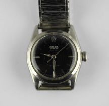 A Rolex Oyster Royal steel circular cased wristwatch, the signed black dial with silvered baton hour