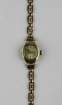 A Caravelle 9ct gold cased ladies wristwatch gross weight excluding movement 8.3g (a/f - damaged)