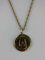 A 9ct gold pendant mounted with a gold Archbishop Makarios III medallion 1966 with a gold