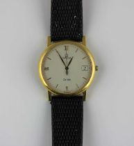 An Omega De Ville 18ct gold circular cased wristwatch the signed dial with gilt Roman and baton hour