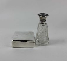 A George V glass scent bottle and stopper with silver and tortoiseshell lid, London 1917, together