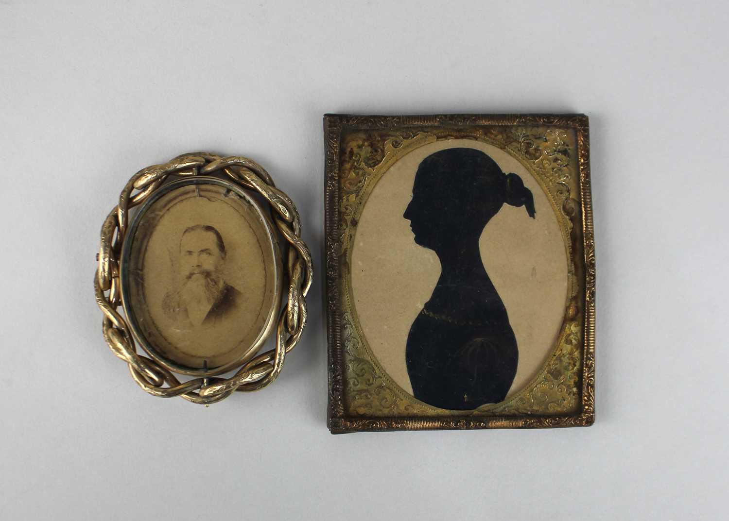 F W Seville (1797-1866), bronzed silhouette of a lady, verso indistinctly inscribed in pencil and