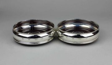 A pair of Elizabeth II silver wine coasters, maker Carr's of Sheffield Ltd, Sheffield 1998, boxed