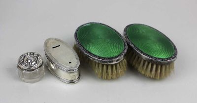 A pair of early 20th century silver and green enamel small dressing table brushes a Victorian